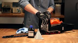 How to Add Bar and Chain Oil to Your Gas Chainsaw [upl. by Annoed]